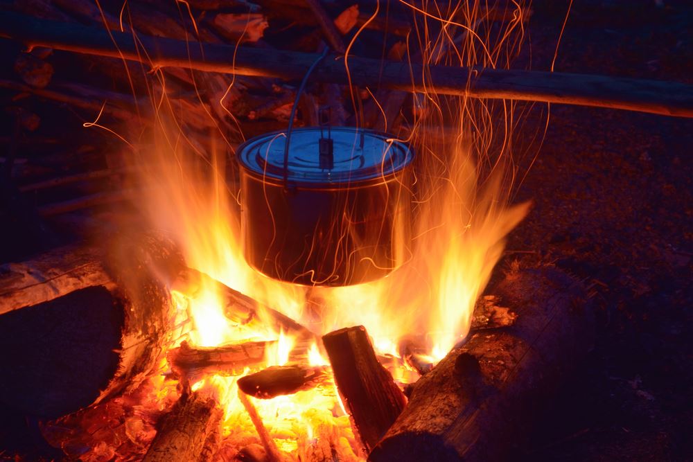 pot cooking over an open fire