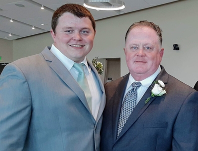 Jacob and Billy Gouty in suits