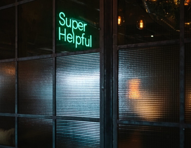 Neon super helpful sign