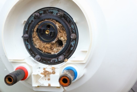 water heater filled with sediment