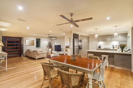 open concept room with ceiling  fan