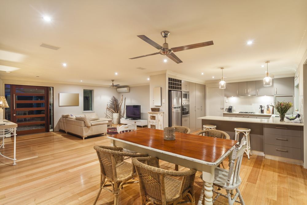 open concept room with ceiling fan