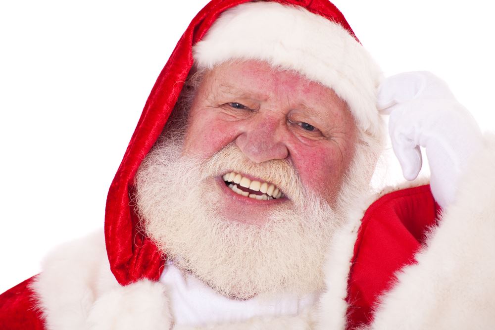 Close up photo of Santa scratching his head
