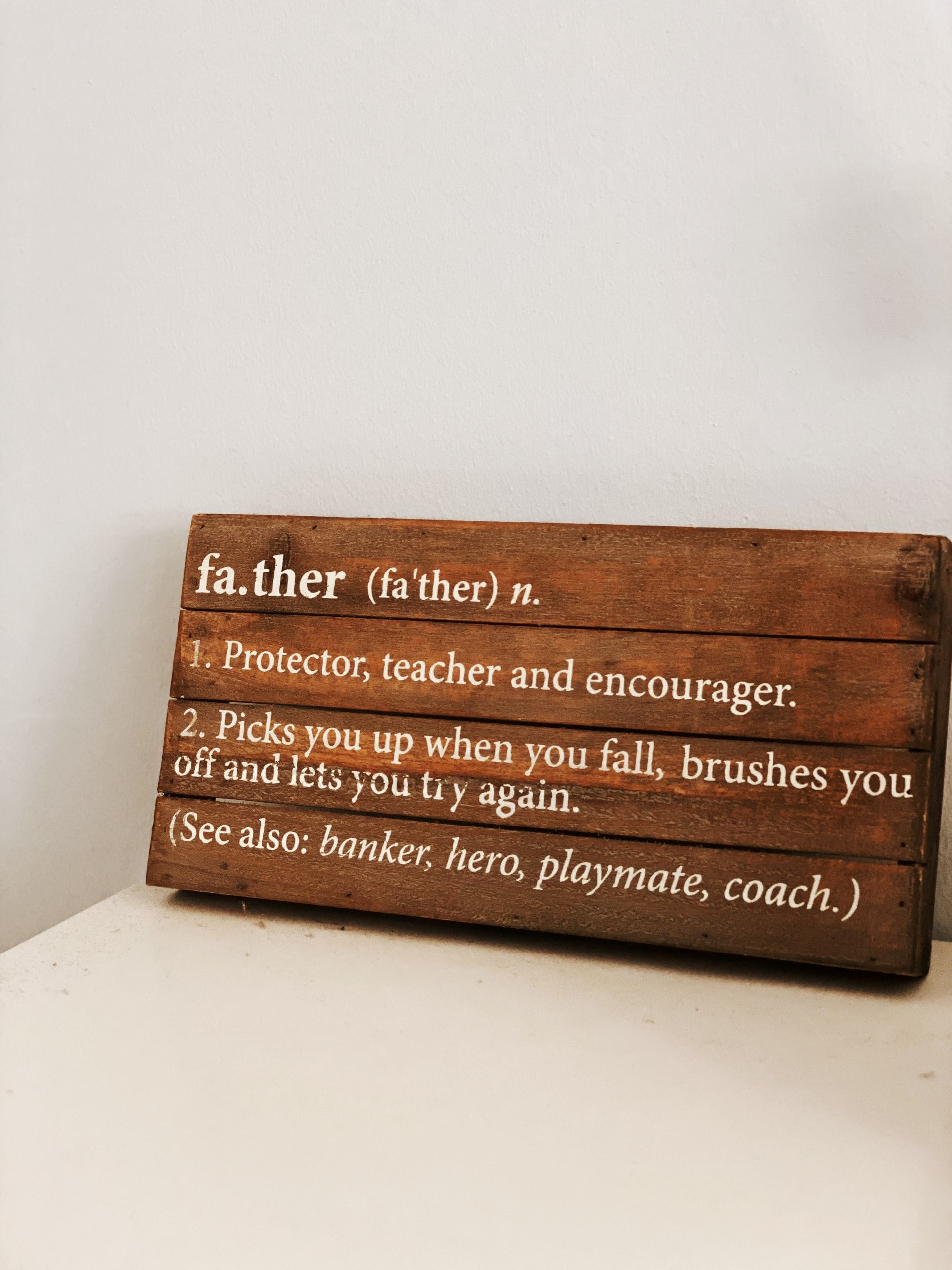 words son a wooden board about fathers